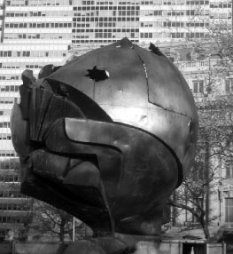 Statue of the globe managled by the destruction of the World Trade Center now located in Manhattan's Battery Park.